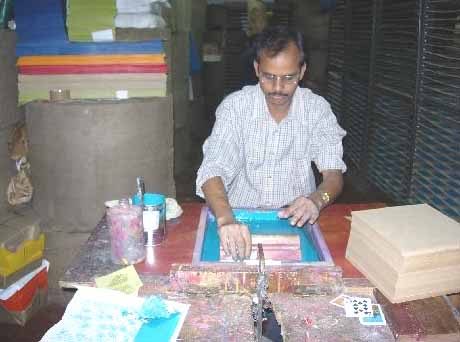 Silk-screen printing by hand at Chimanlals